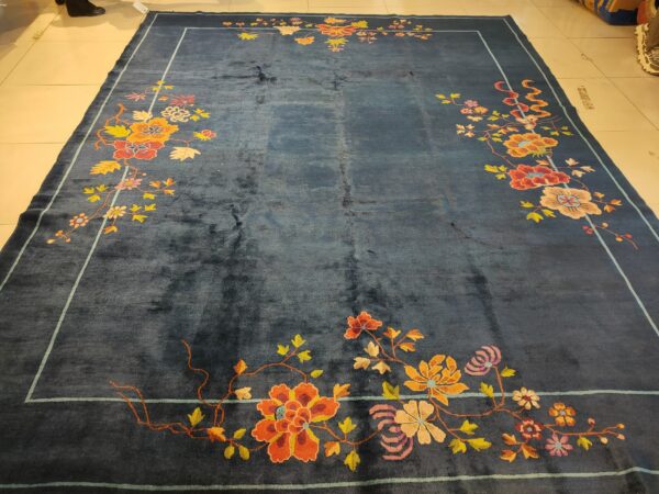 Navy blue color field antique floral pattern chinese deco rug by walter nichols 8 Navy blue color field antique floral pattern chinese deco rug by walter nichols, detail photo 1, stock number 25227