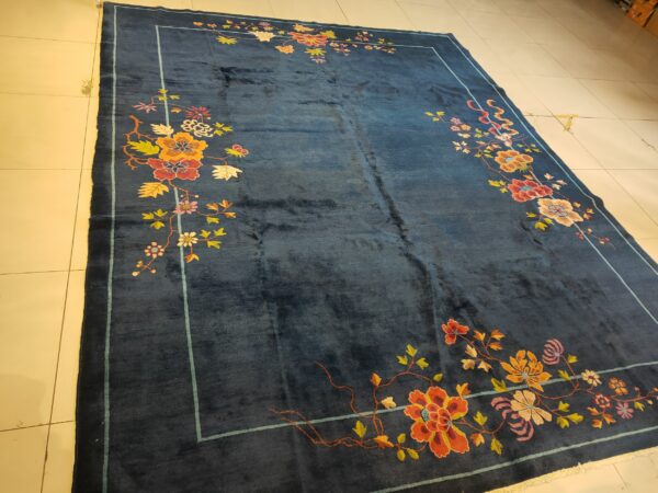 Navy blue color field antique floral pattern chinese deco rug by walter nichols 21 Navy blue color field antique floral pattern chinese deco rug by walter nichols, detail photo 14, stock number 25227