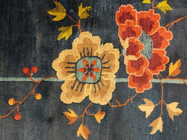 Navy blue color field antique floral pattern chinese deco rug by walter nichols 25 Navy blue color field antique floral pattern chinese deco rug by walter nichols, detail photo 18, stock number 25227