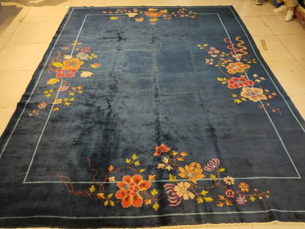 Navy blue color field antique floral pattern chinese deco rug by walter nichols 9 Navy blue color field antique floral pattern chinese deco rug by walter nichols, detail photo 2, stock number 25227