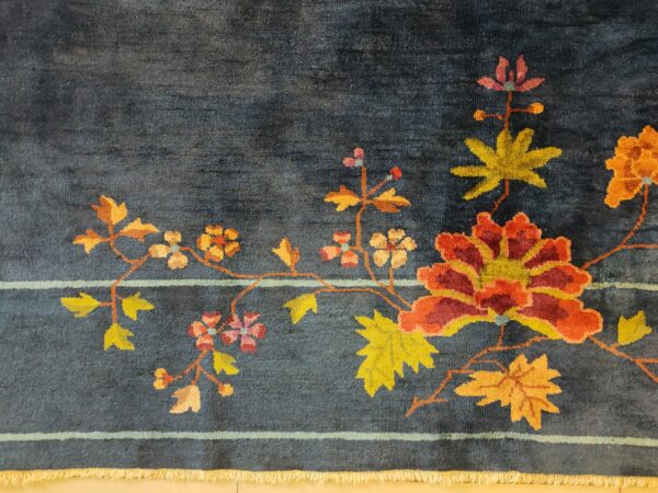 Navy blue color field antique floral pattern chinese deco rug by walter nichols 27 Navy blue color field antique floral pattern chinese deco rug by walter nichols, detail photo 20, stock number 25227