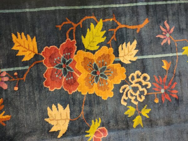 Navy blue color field antique floral pattern chinese deco rug by walter nichols 29 Navy blue color field antique floral pattern chinese deco rug by walter nichols, detail photo 22, stock number 25227
