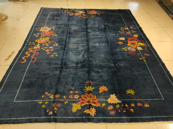 Navy blue color field antique floral pattern chinese deco rug by walter nichols 11 Navy blue color field antique floral pattern chinese deco rug by walter nichols, detail photo 4, stock number 25227