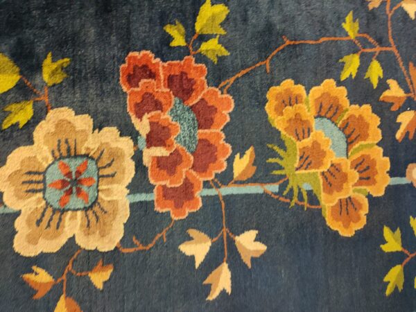 Navy blue color field antique floral pattern chinese deco rug by walter nichols 15 Navy blue color field antique floral pattern chinese deco rug by walter nichols, detail photo 8, stock number 25227