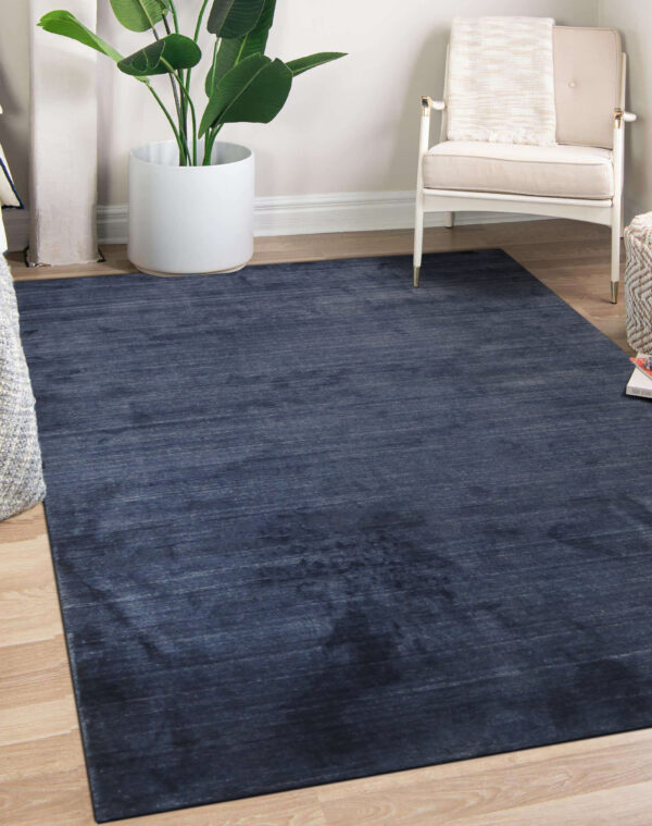 Loom urban navy handmade wool & viscose rug - 8 x 10 size rugs 8 Navy blue solid rug styled in a bright living room (sku ocu90nv8x10)