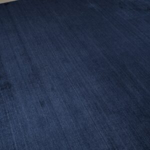 Navy blue solid rug surface showing the sheen of the viscose (SKU OCU90NV8X10)