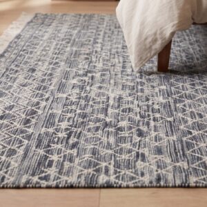 Penelope Kilim Charcoal and Ivory Handmade Wool Rug - bedroom in-room detail