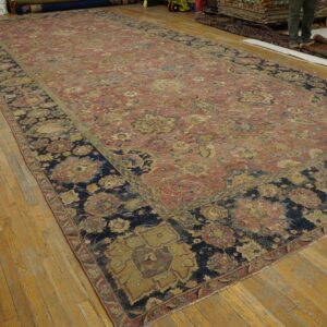 Mid-17th century Persian Safavid Isfahan carpet, corner view with the dark blue palmette border, stock number 20133