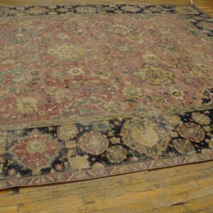 Mid-17th century Persian Safavid Isfahan carpet, end of the carpet showing the border and coral field, stock number 20133