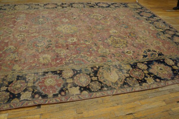 Mid-17th century persian safavid isfahan carpet, end of the carpet showing the border and coral field, stock number 20133